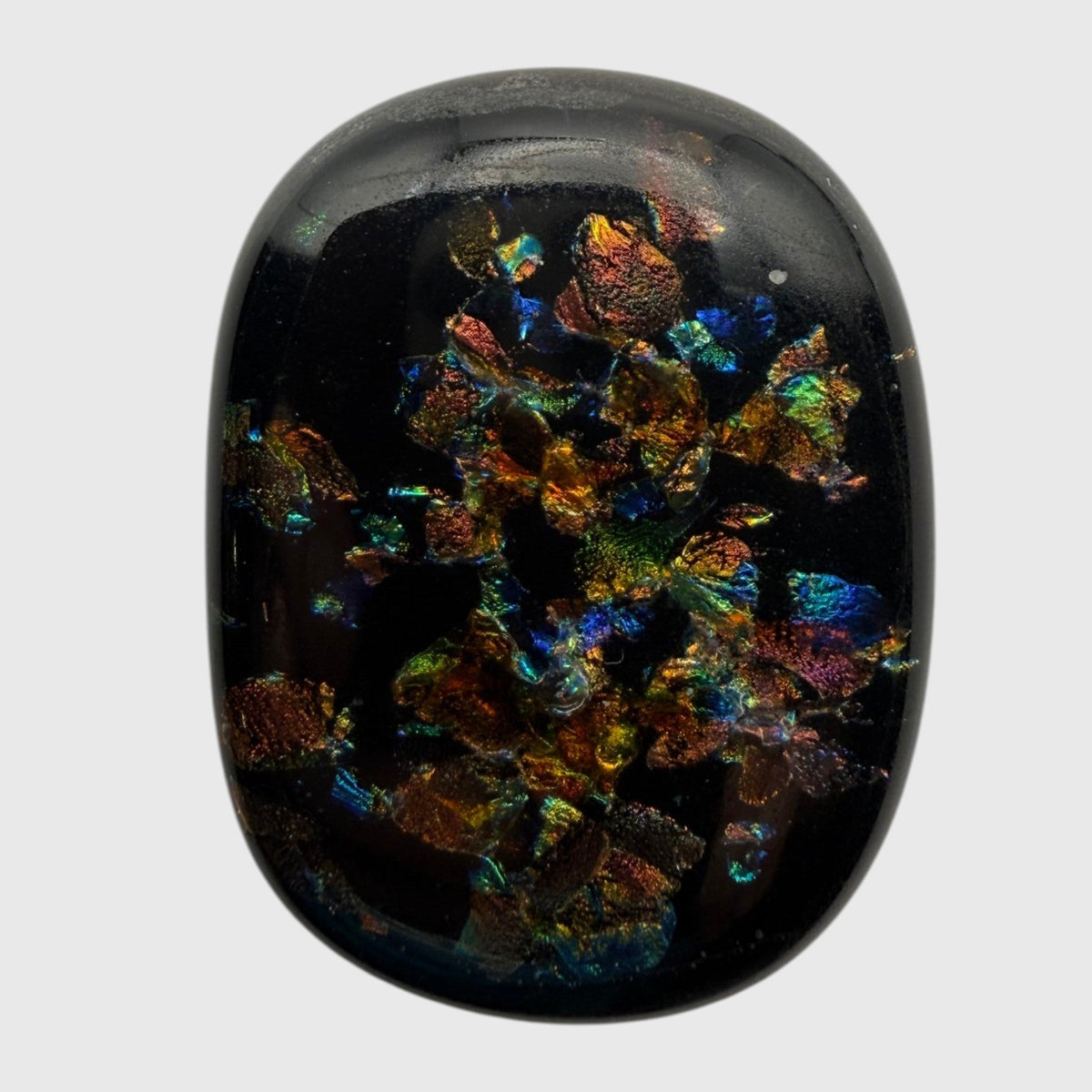SunshineBeads handmade oval dichroic fused glass cabochon with iridescent multicolor mosaic flakes on a black base